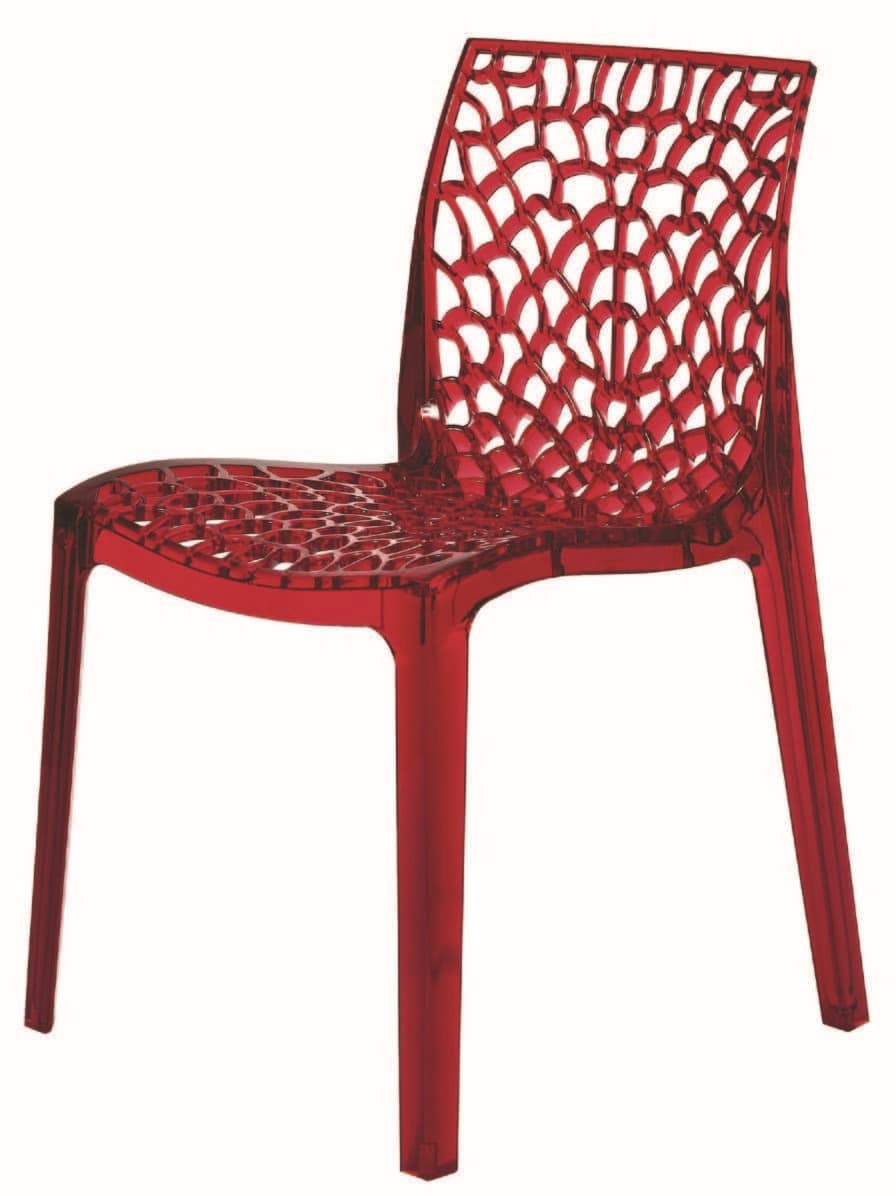 Transparent perforated plastic chair suited for outdoors