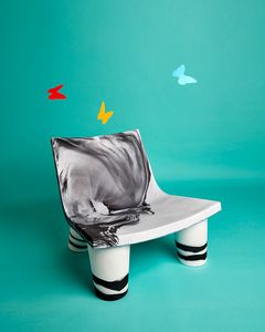 Low Lita Anniversary, Lounge armchair with a strong aesthetic impact