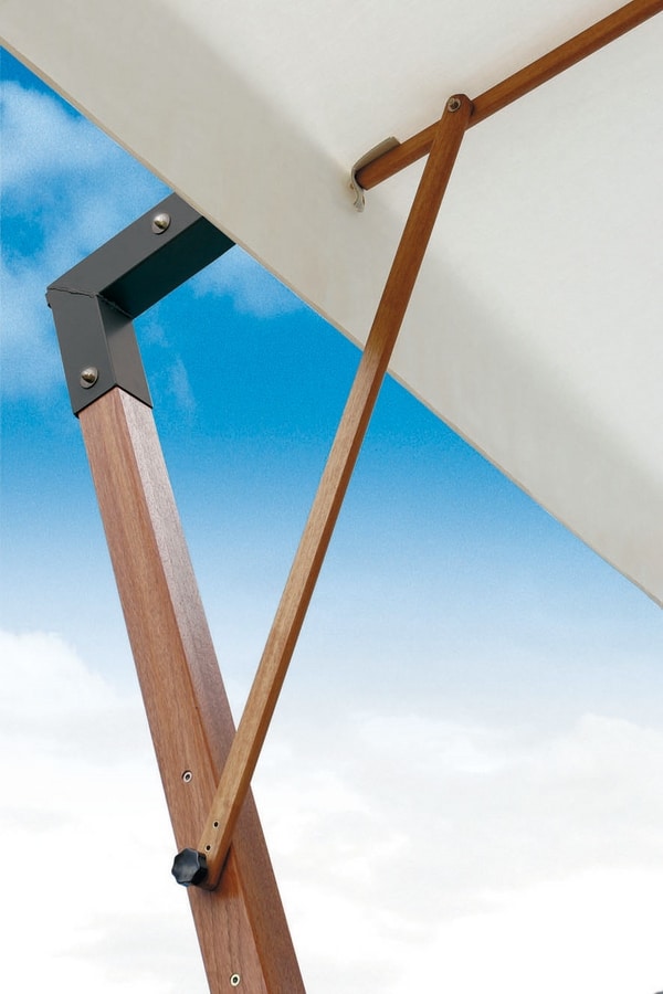 Parasol with wind-stop system |