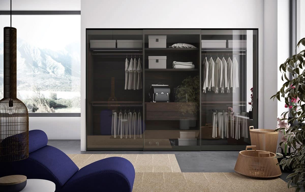Vitrum, Wardrobe in burnished aluminum and clear glass doors