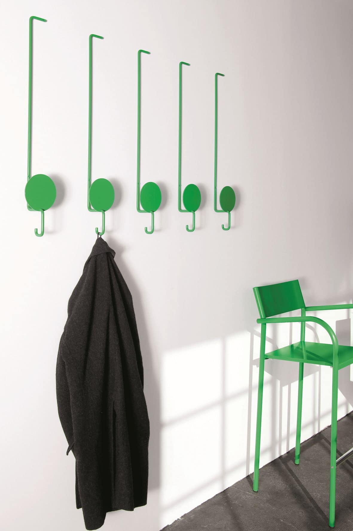 Sun, Colorful clothes hangers, in lacquered metal, for modern environments