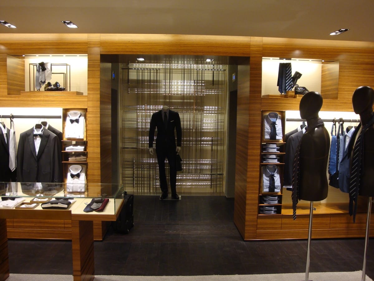 Bespoke display unit for clothes shop, Metal display elements for shops