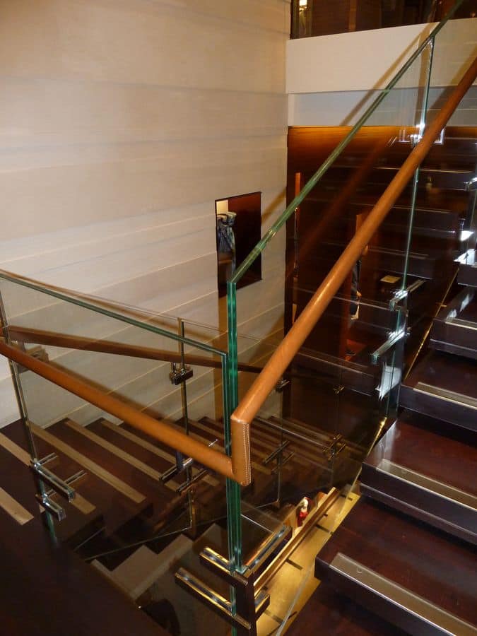 Polished stainless steel stairs, Construction and installation of monumental stairway for showrooms and hotels