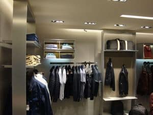 Custom made shelving for display, Realization of shopfitting on measure with shelves and hanging bars for shops