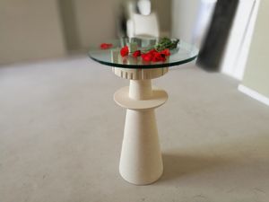 Agorà, Table with glass top, carved stone base