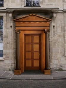 Giove, Wooden front door with columns and capitals, carved by master craftsmen