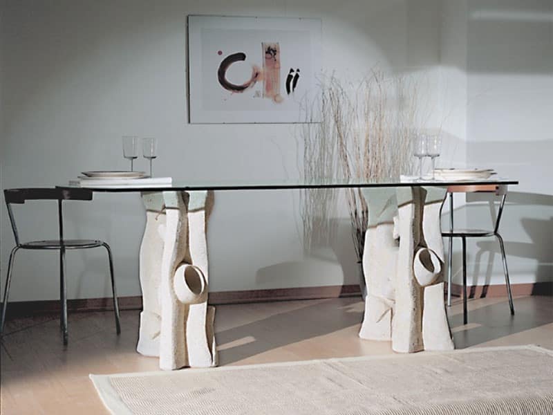 Magellano, Dining table with top in glass and base in stone
