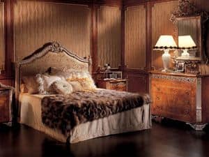162, Classical carved wooden bed, with upholstered headboard