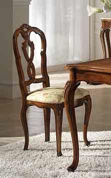 P 601, Walnut chair with upholstered seat and backrest carved