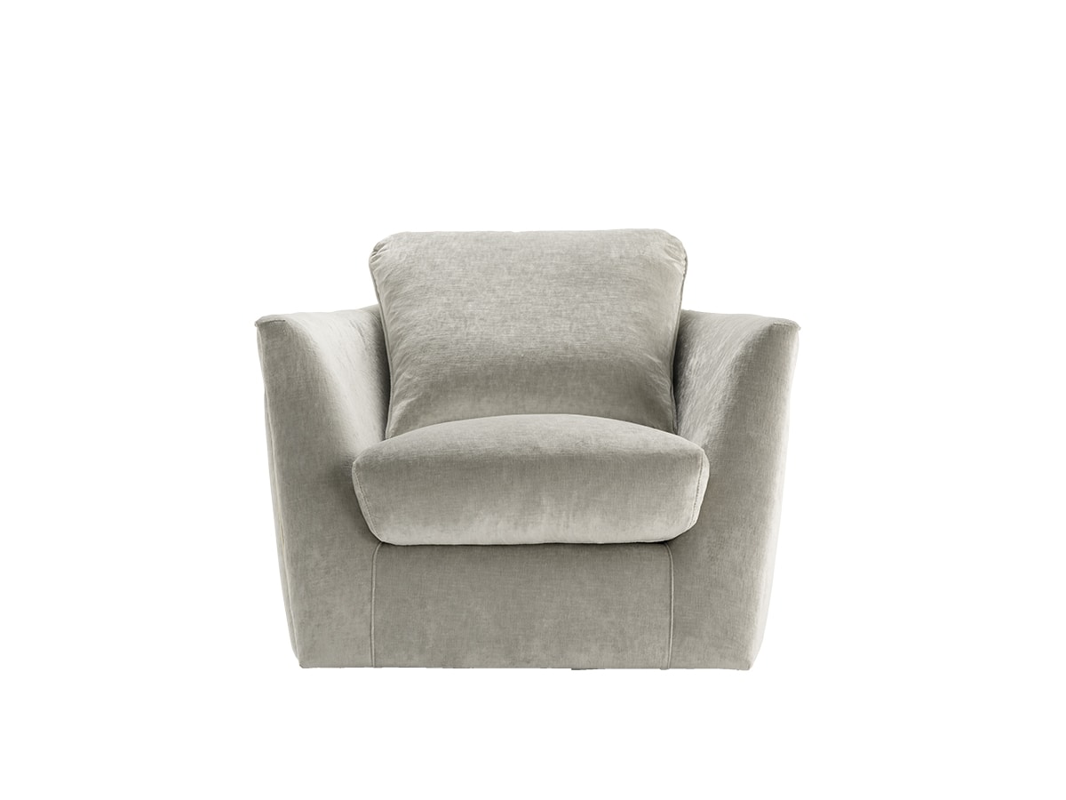 Ava, Armchair with rounded shape and metal decorations