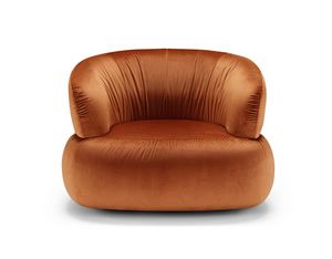Dana, Solid armchair with generous curves