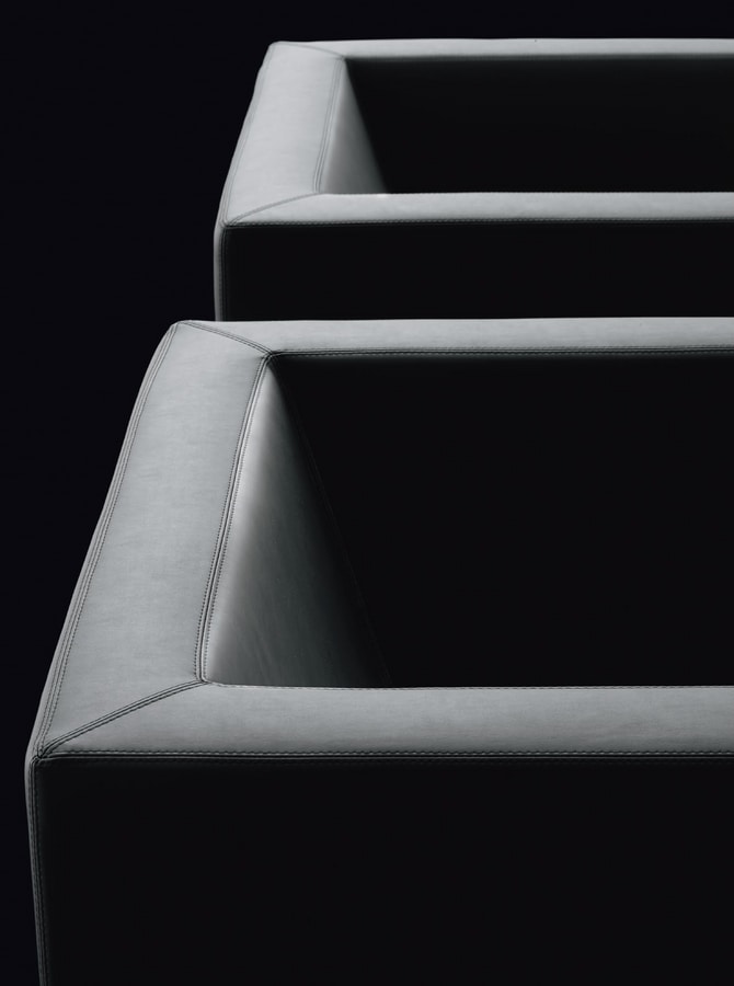 NAXOS, Armchair with rigorous shapes