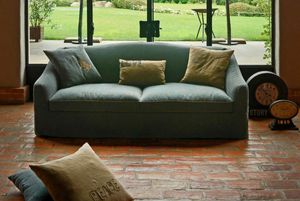 Carolina, Sofa covered in fabric, with rounded armrest