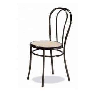 002, Chair in curved metal, sitting in Vienna straw
