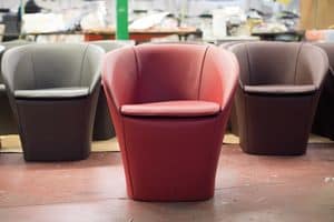 Farra, Modern tub armchair, in leather covered