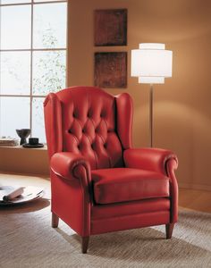Agata armchair, Leather armchair with capitonn� workmanship