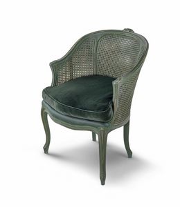 Armchair 9311, Enveloping armchair with cane backrest