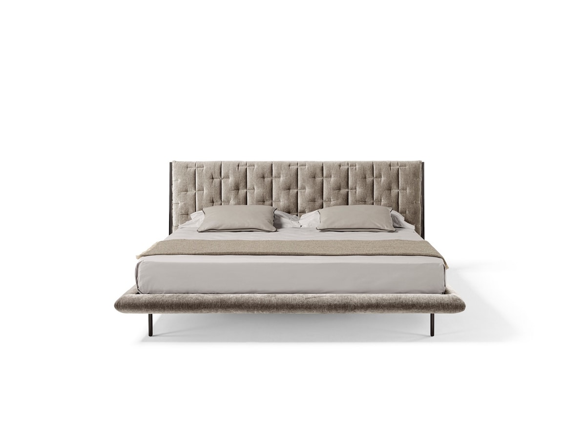 Muzzle, Upholstered bed with large headboard