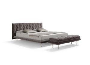 Muzzle, Upholstered bed with large headboard