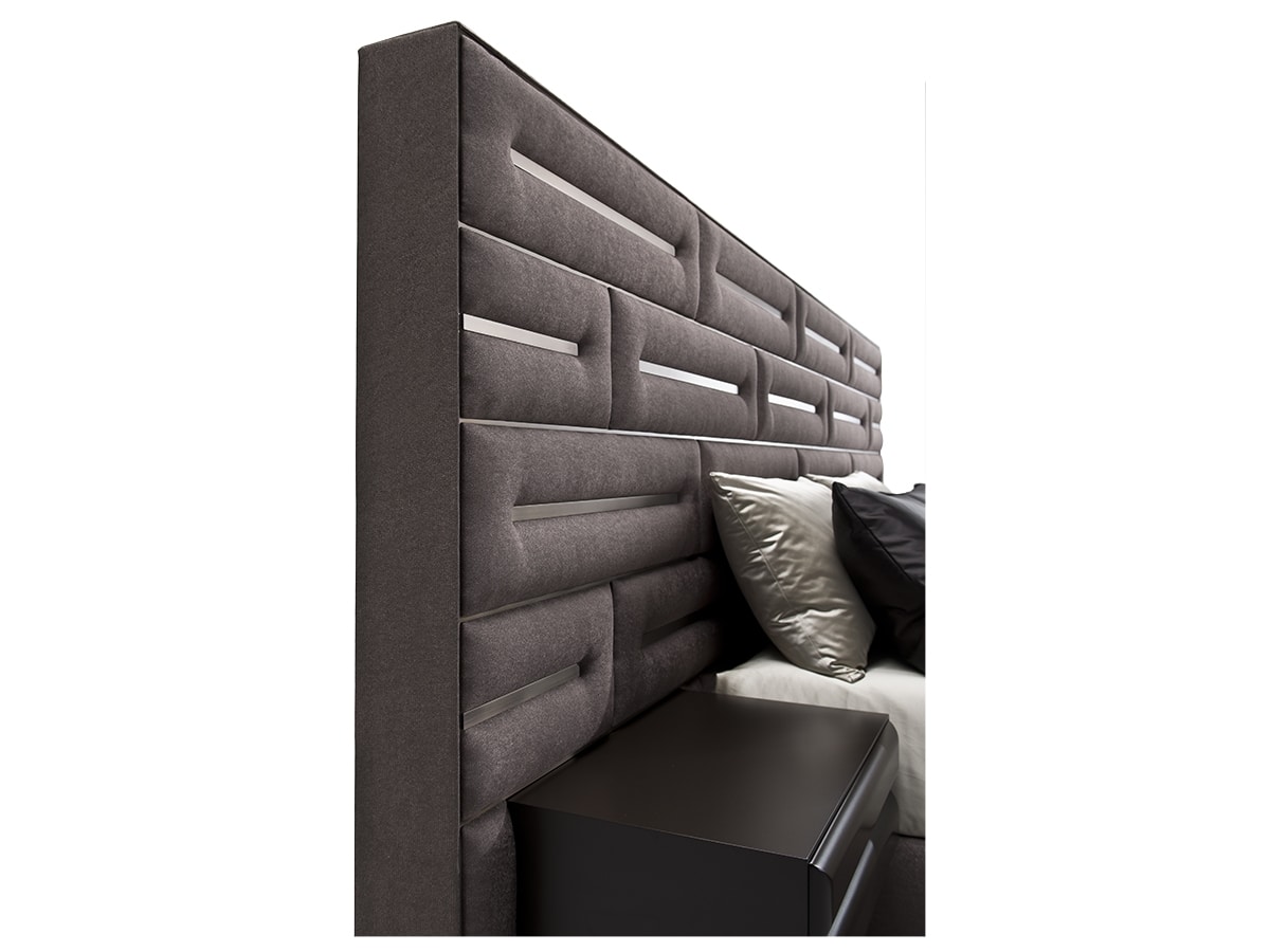 Wall, Bed with a characteristic padded headboard
