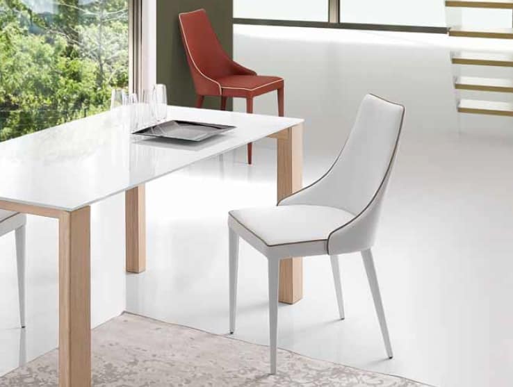 Nives, Upholstered chair with enveloping backrest