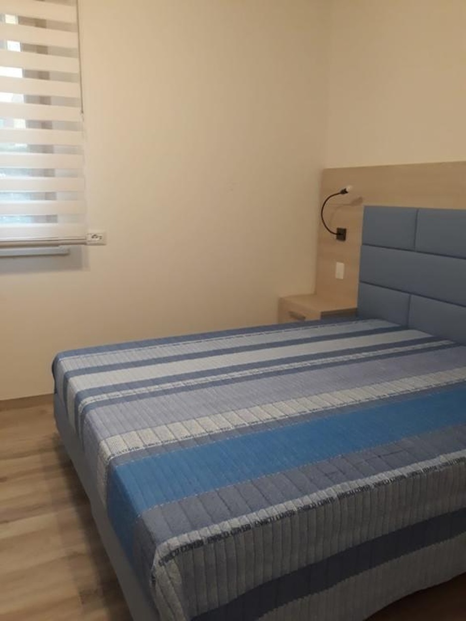 Furnishings for B&B rooms in Trentino, Italy