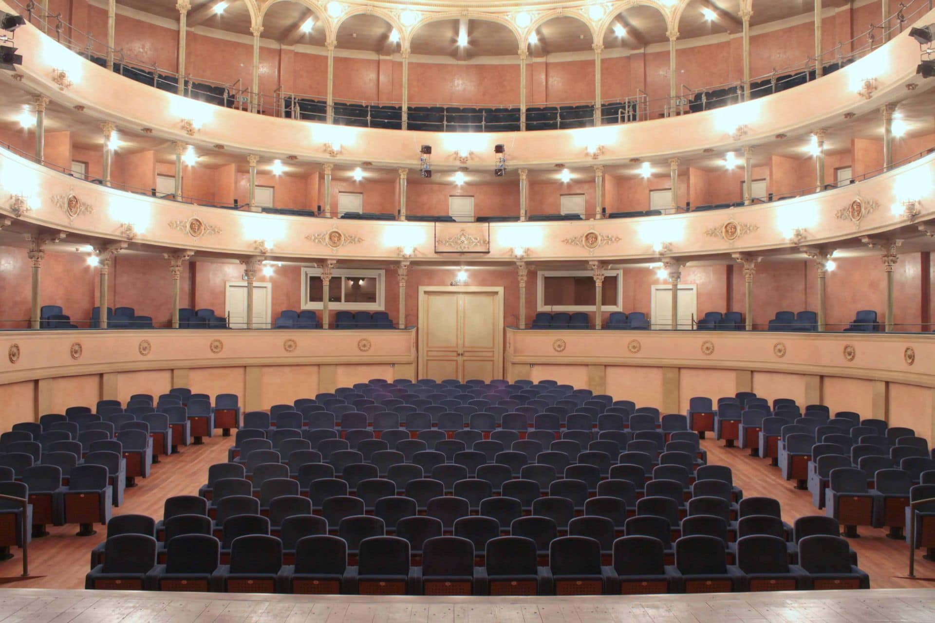 Lugano armchairs in Ariosto Teather