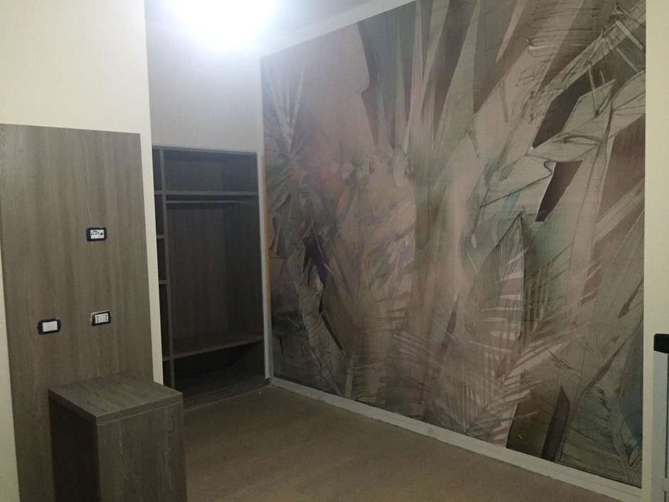 Hotel room furniture in Bologna, Italy